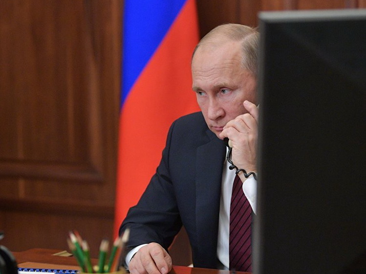 Путин обсудил с Меркель международные проблемы