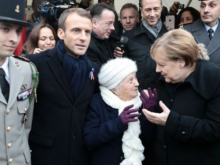 Меркель в Париже перепутали с женой Макрона – ВИДЕО