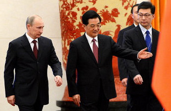 Путин примет участие в саммите ШОС и встретится с руководством Китая
