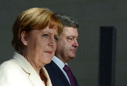 Порошенко и Меркель поддержали минский формат переговоров по Украине