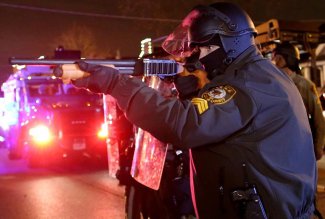 В США с августа полицейские застрелили 14 подростков после убийства в Фергюсоне