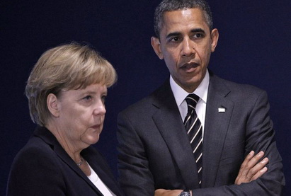 Обама и Меркель договорились не ослаблять санкции против России