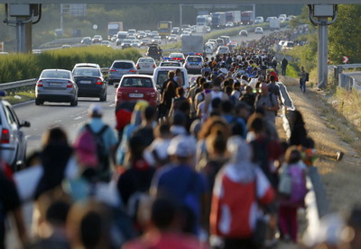 Австрия и Германия впустят беженцев из Венгрии